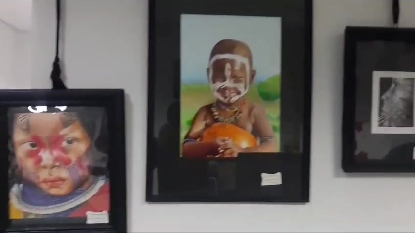 Other framed drawings in the same exhibition