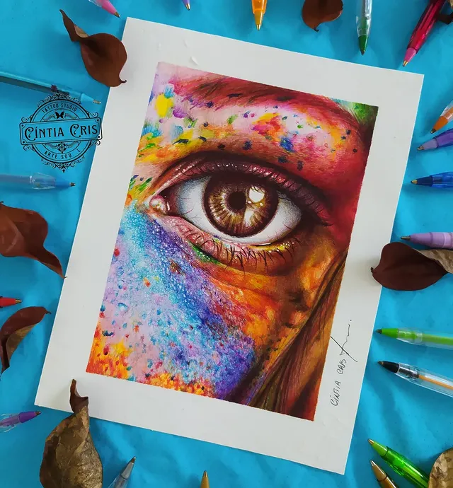 Drawing of a human eye with vibrant colour in ballpoint pen, by Cíntia Cris